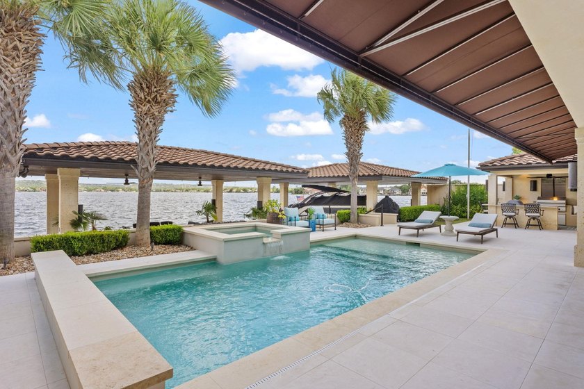 Nestled along the coveted waterfront on Lighthouse Drive in - photo 28