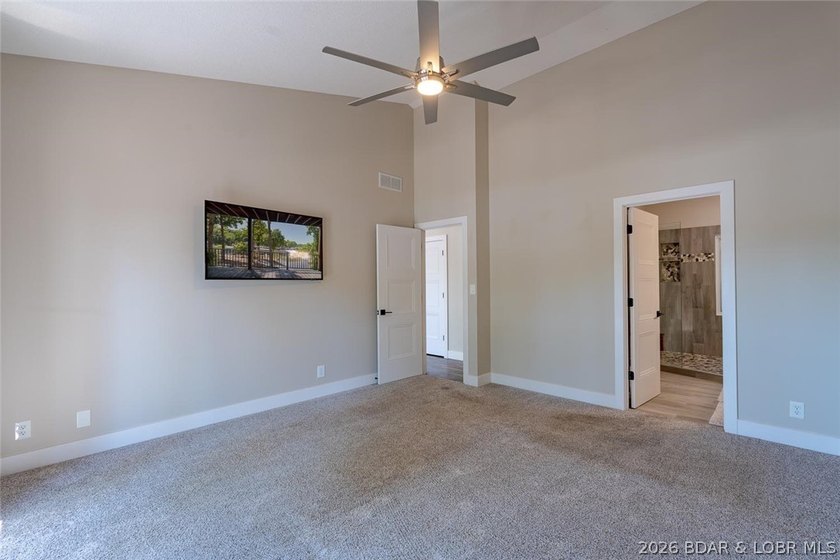 Newly updated lakefront home in Four Seasons with Brand New Roof - photo 27