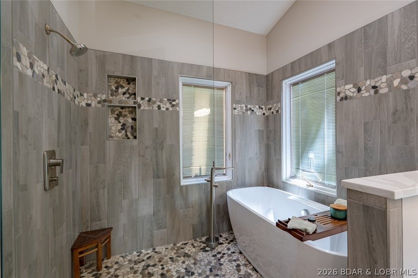 Newly updated lakefront home in Four Seasons with Brand New Roof - photo 29