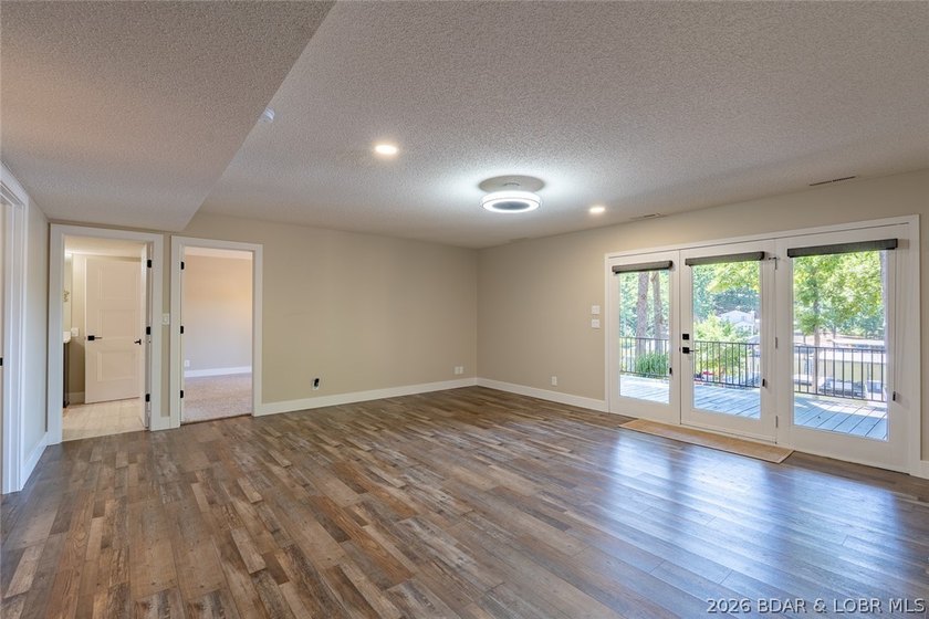 Newly updated lakefront home in Four Seasons with Brand New Roof - photo 32