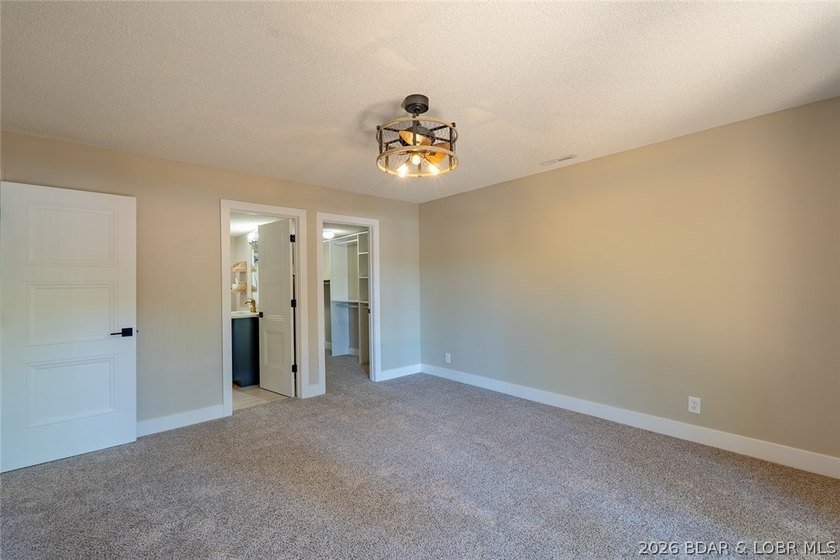 Newly updated lakefront home in Four Seasons with Brand New Roof - photo 40