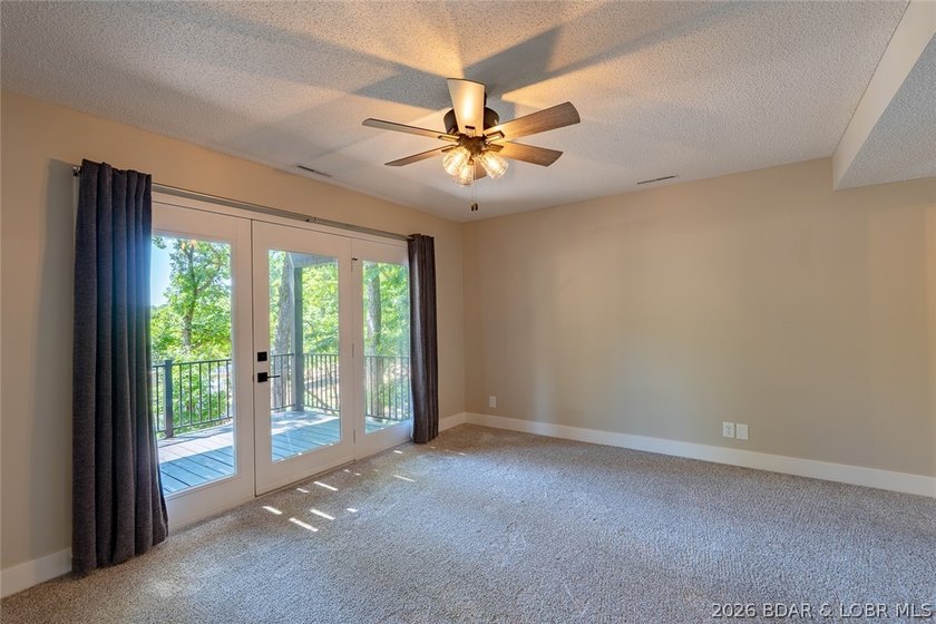 Newly updated lakefront home in Four Seasons with Brand New Roof - photo 45