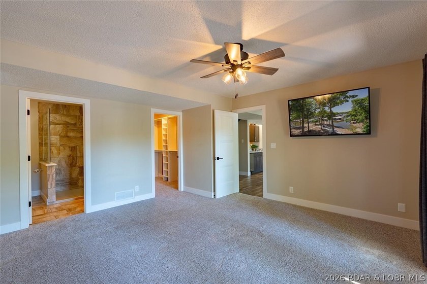 Newly updated lakefront home in Four Seasons with Brand New Roof - photo 46