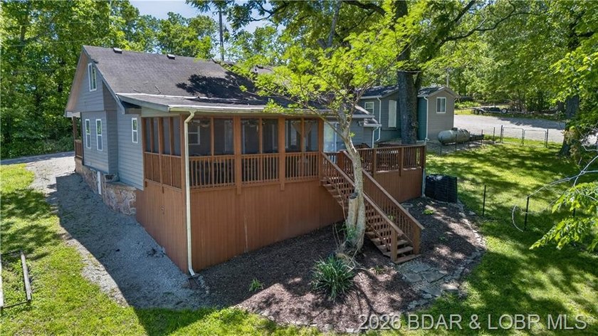 Take a look at this beautiful 4-bedroom, 2-bath home at the Lake - photo 6