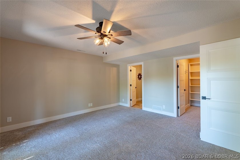 Newly updated lakefront home in Four Seasons with Brand New Roof - photo 47
