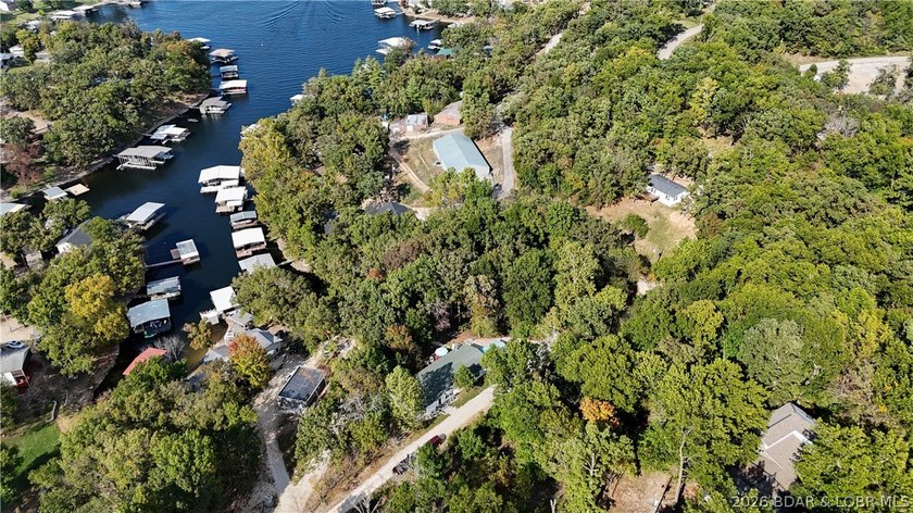 Welcome to your lakefront retreat! This super cute, updated 4 - photo 4