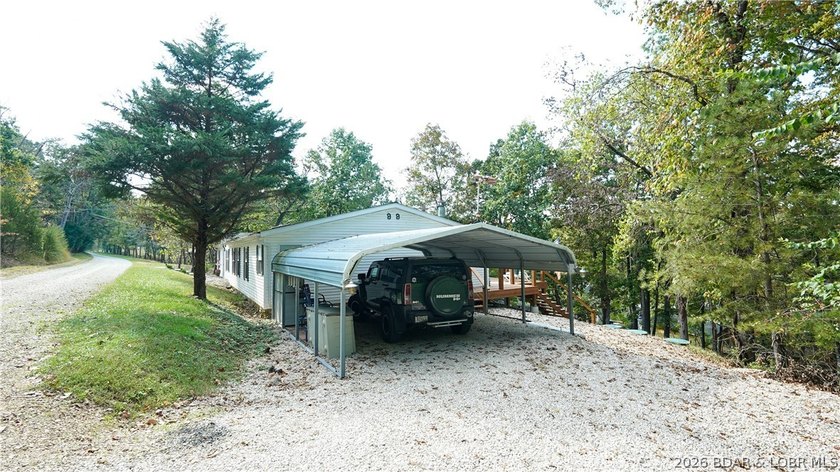 Welcome to your lakefront retreat! This super cute, updated 4 - photo 7