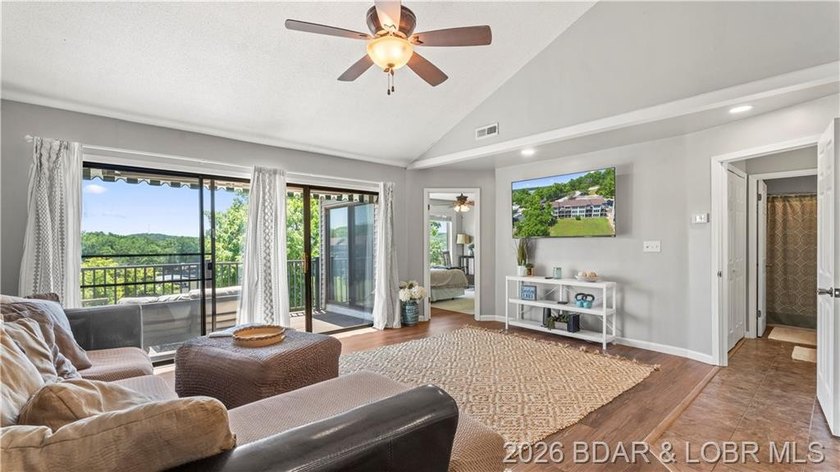 Enjoy lake living with comfort, convenience, and investment - photo 2