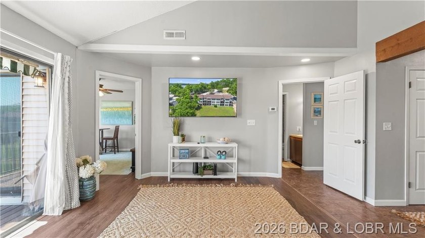 Enjoy lake living with comfort, convenience, and investment - photo 5