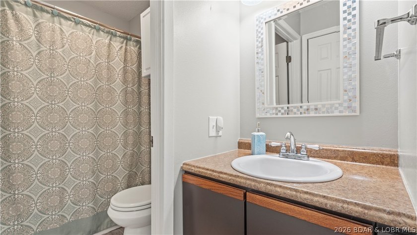 Enjoy lake living with comfort, convenience, and investment - photo 9