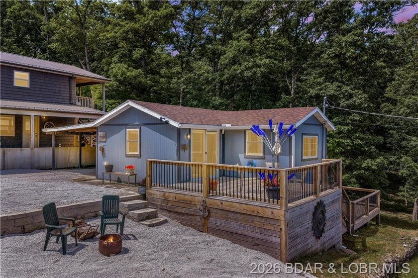 Lake-view property featuring a main residence(28251 Shore Rd) - photo 3