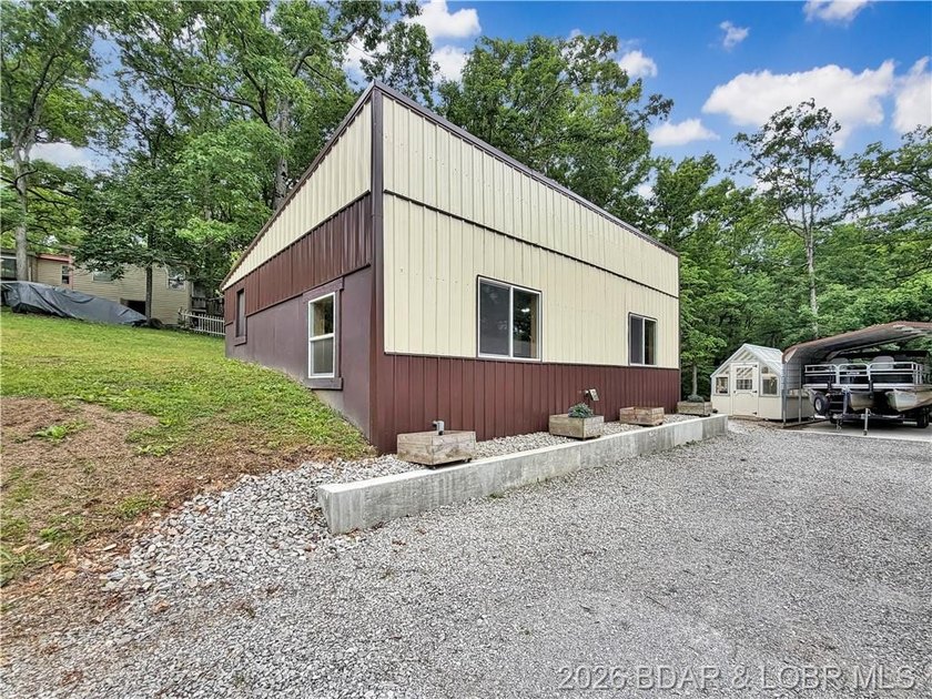 Lake-view property featuring a main residence(28251 Shore Rd) - photo 8