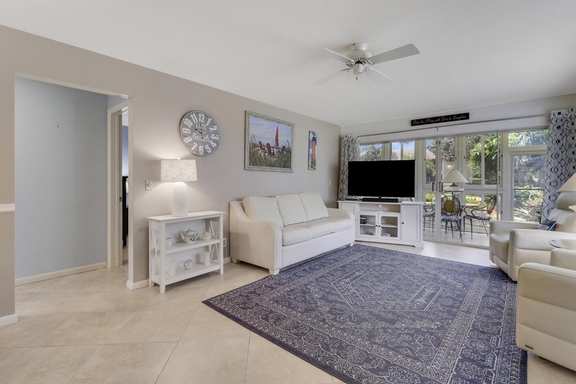 Only available ground-floor end unit in the sought-after - photo 11