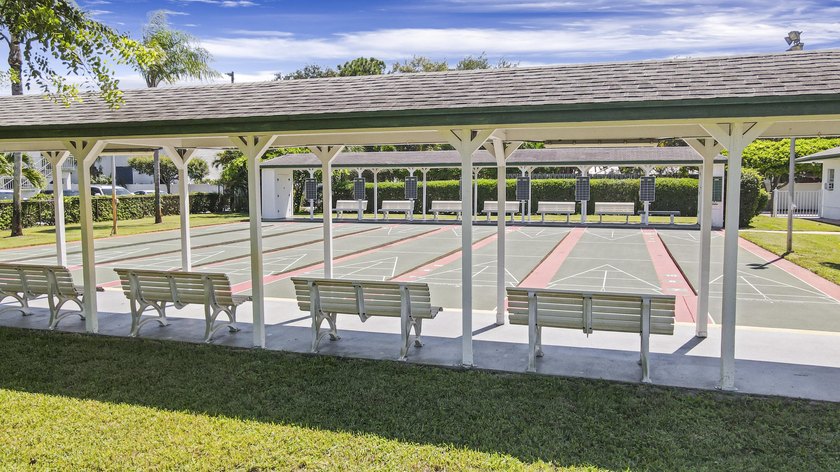 Only available ground-floor end unit in the sought-after - photo 24