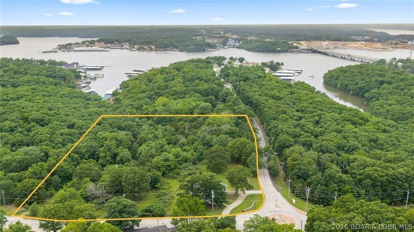 7.8 +/- wooded acres in the heart of Osage Beach with city sewer - photo 3