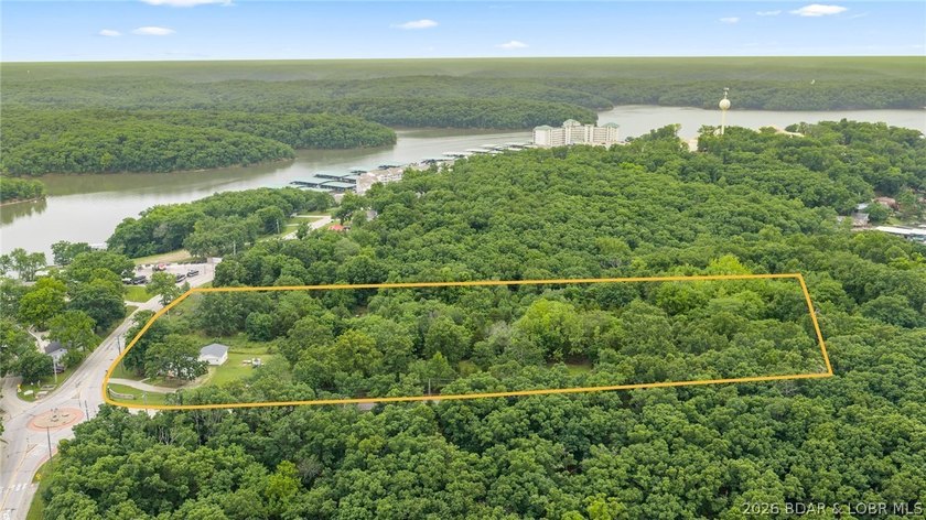 7.8 +/- wooded acres in the heart of Osage Beach with city sewer - photo 4