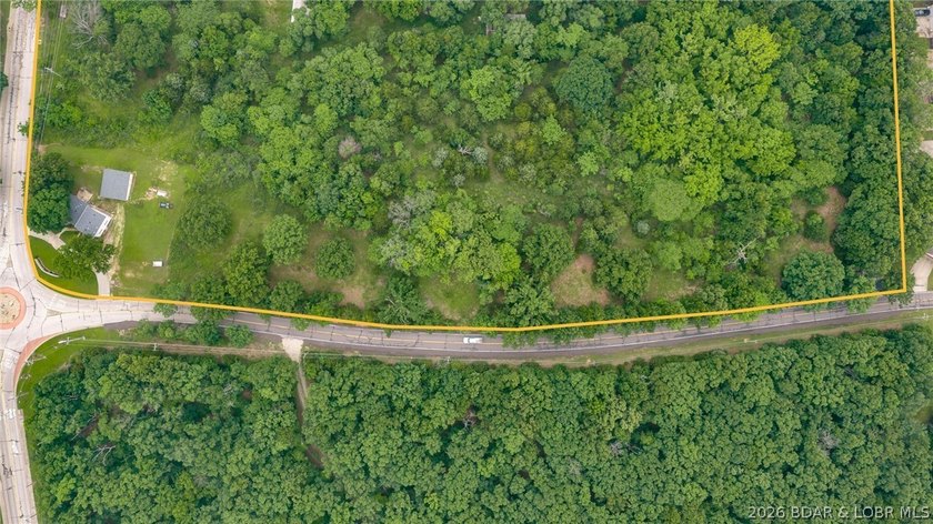 7.8 +/- wooded acres in the heart of Osage Beach with city sewer - photo 6