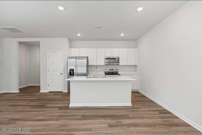 Discover the Burton, a spacious and stylish one-story home with - photo 7