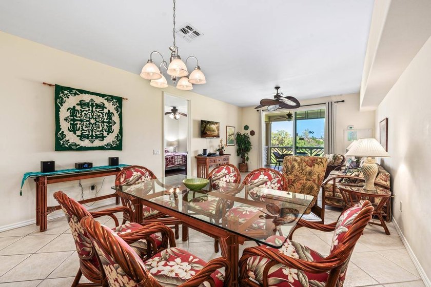 This 2-bedroom, 2-bath condo is located on the second floor and - photo 6