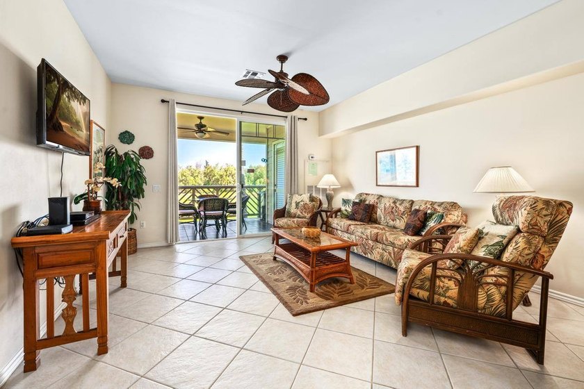 This 2-bedroom, 2-bath condo is located on the second floor and - photo 7