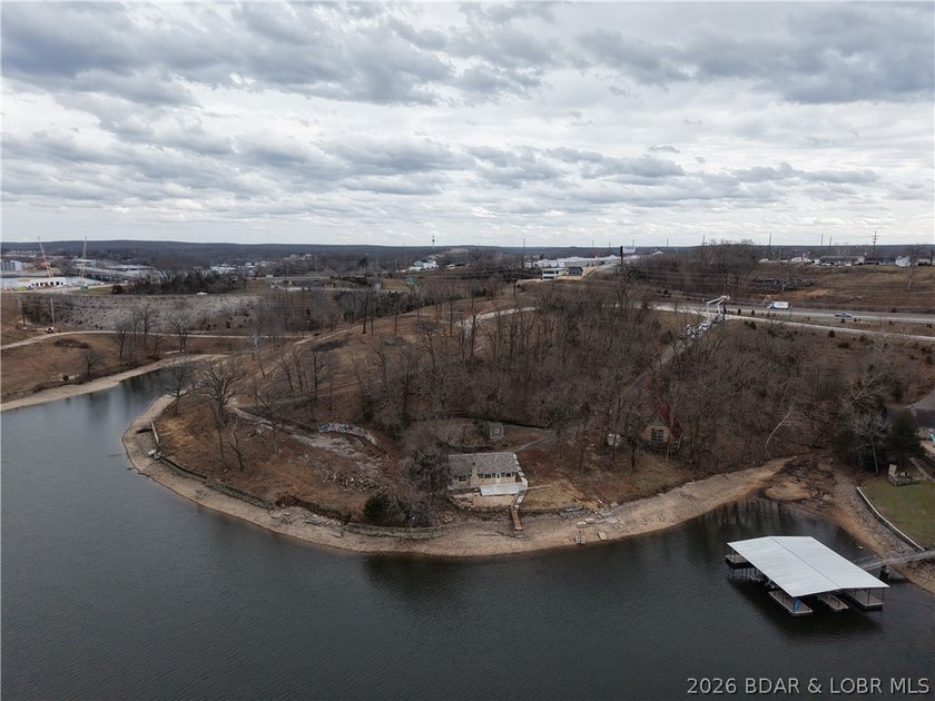 Value is in the land! Incredible 1.75+/- acre lakefront tract - photo 3