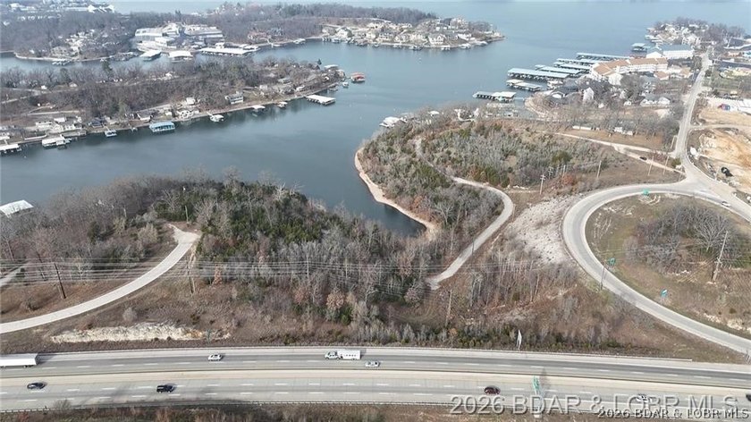 Value is in the land! Incredible 1.75+/- acre lakefront tract - photo 5