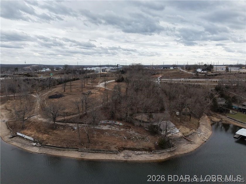 Value is in the land! Incredible 1.75+/- acre lakefront tract - photo 7