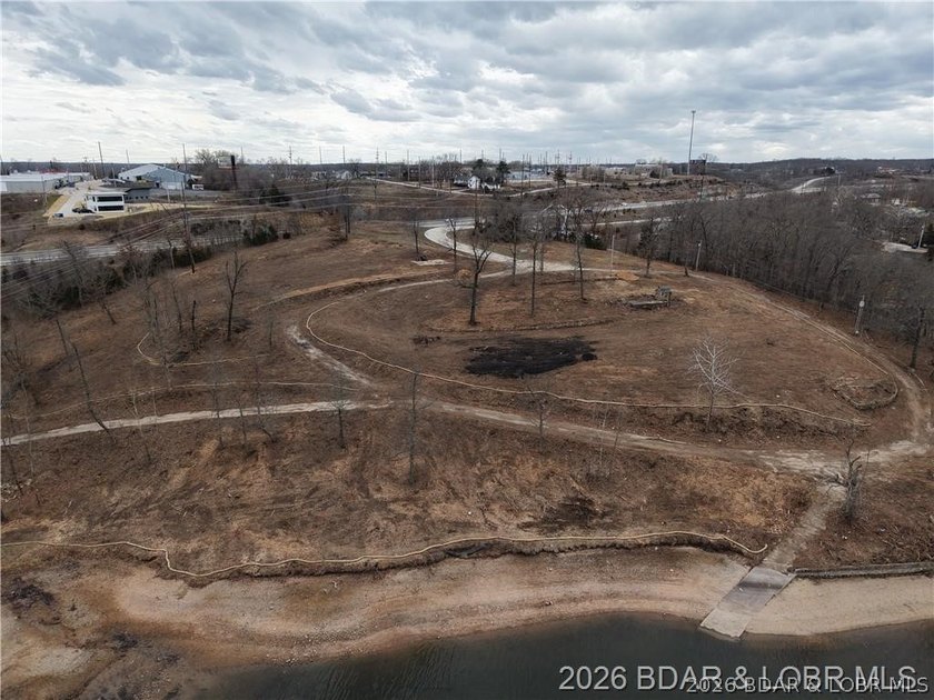 Value is in the land! Incredible 1.75+/- acre lakefront tract - photo 9