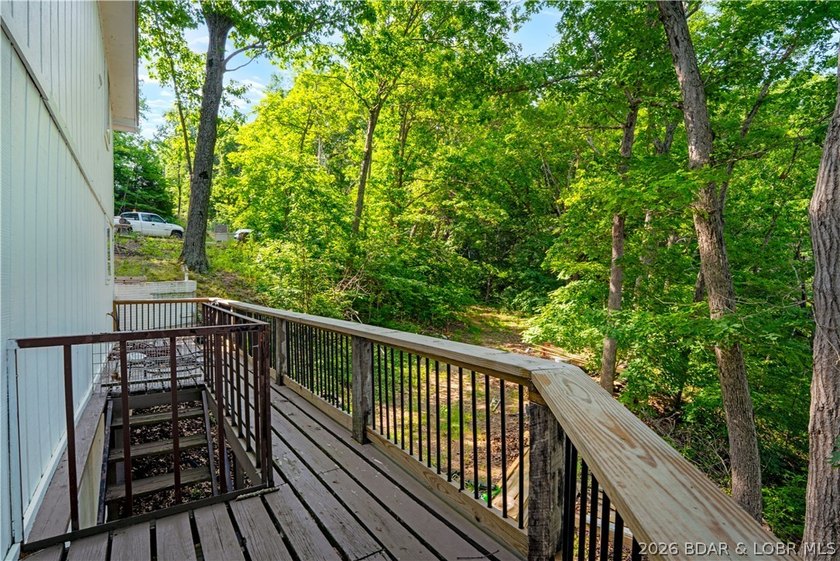 Tucked away on 2.33 lakefront acres, 33400 Kings Way Road offers - photo 10