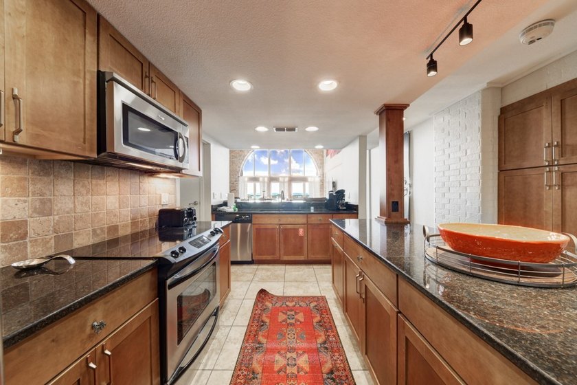 Experience elevated coastal living in this stunning 8th-floor - photo 13