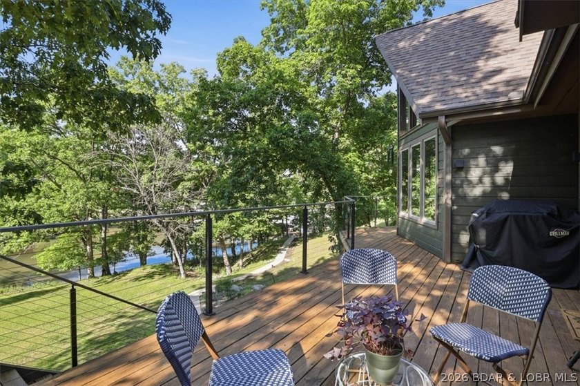 Tucked into the trees on over 8 acres at the 47MM in cove, this - photo 3