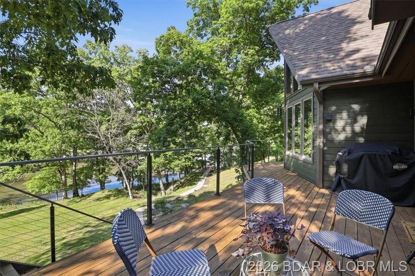 Tucked into the trees on over 8 acres at the 47MM in cove, this - photo 3