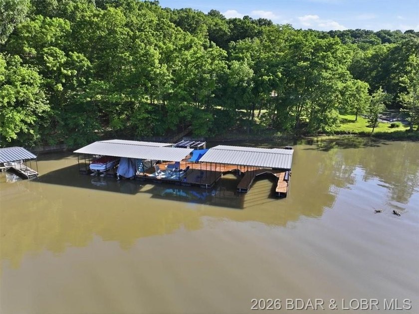Tucked into the trees on over 8 acres at the 47MM in cove, this - photo 4