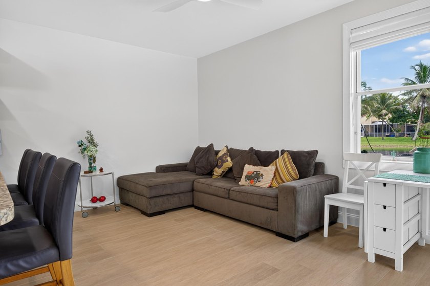 Welcome to this stunning waterfront residence nestled in The - photo 13