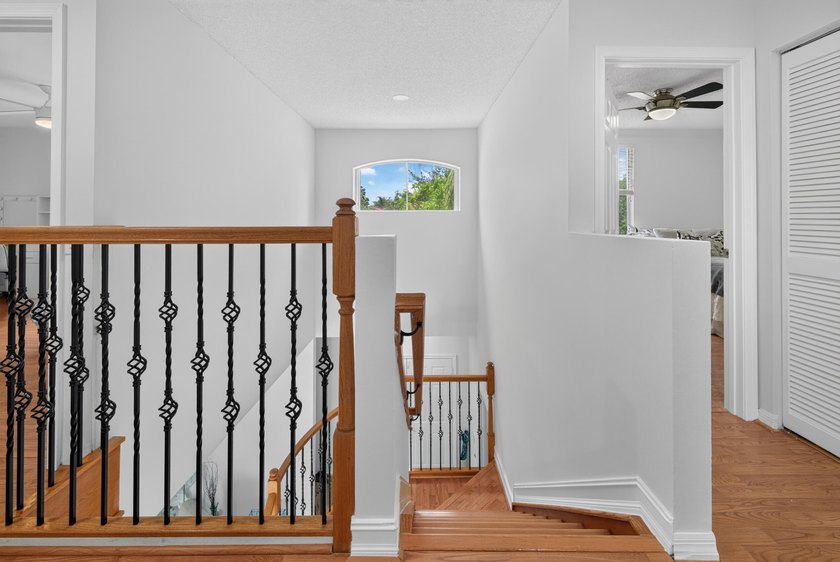 Welcome to this stunning waterfront residence nestled in The - photo 21