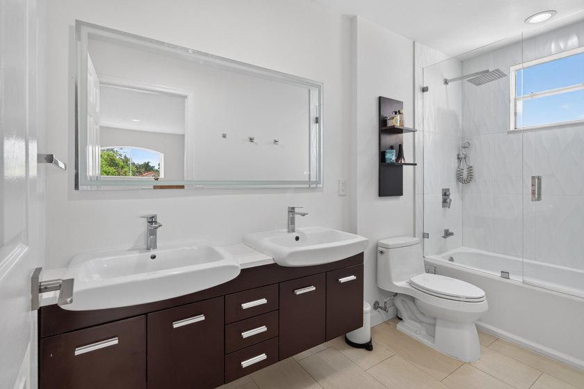 Welcome to this stunning waterfront residence nestled in The - photo 30