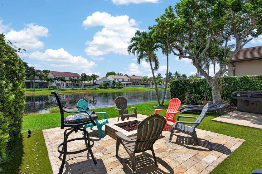 Welcome to this stunning waterfront residence nestled in The - photo 37
