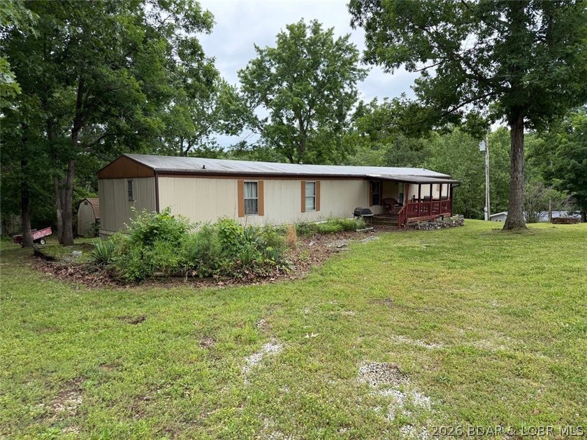 Affordable Lake Living Opportunity in the desirable Osage - photo 2