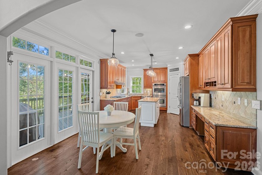 Tucked within the highly desirable Treetops at Cowans Ford - photo 7