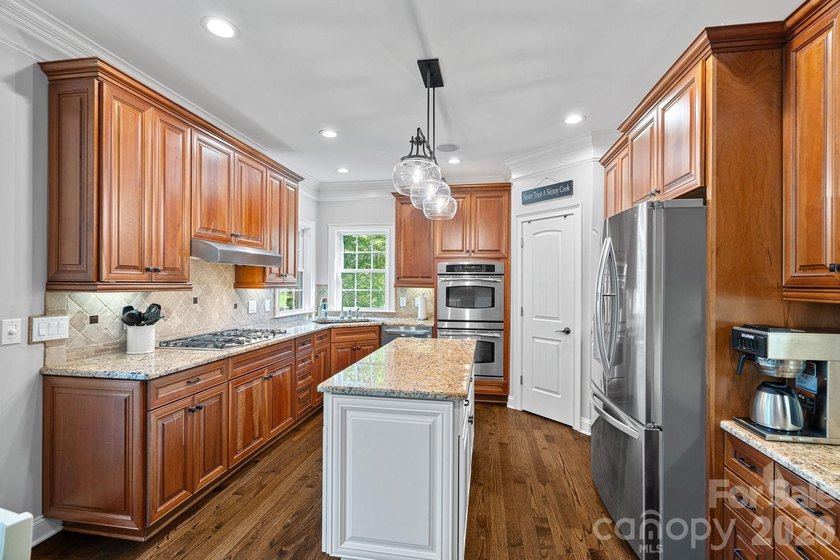 Tucked within the highly desirable Treetops at Cowans Ford - photo 8