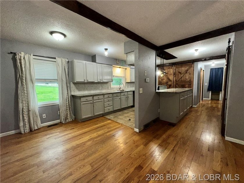 4-bed, 2-bath home in Warsaw featuring an open floor plan - photo 10