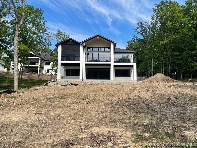 WOW Setting! New Construction! Sitting on over 1/2 an acre, this - photo 3