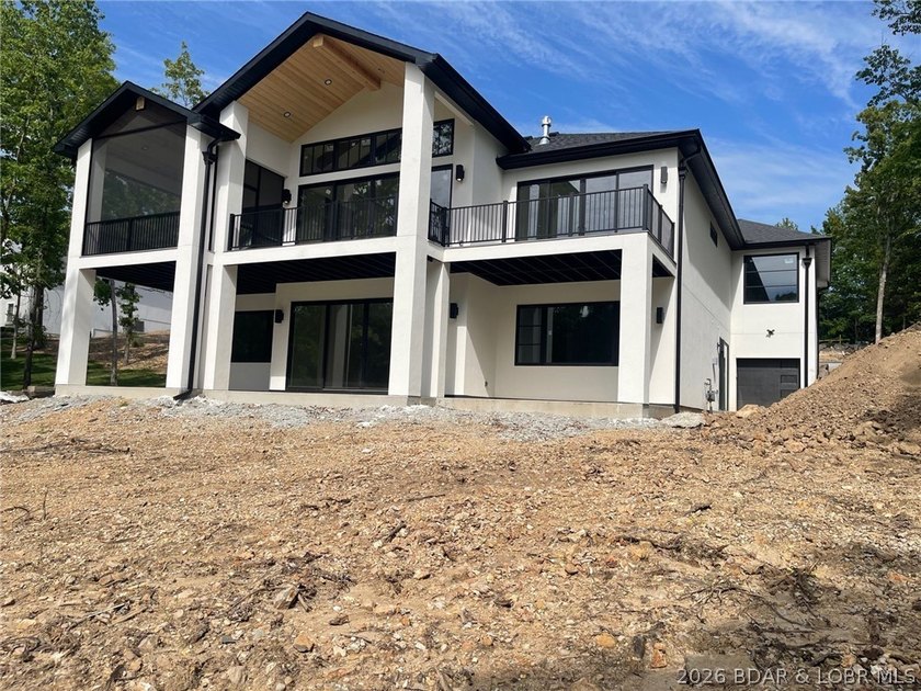 WOW Setting! New Construction! Sitting on over 1/2 an acre, this - photo 4