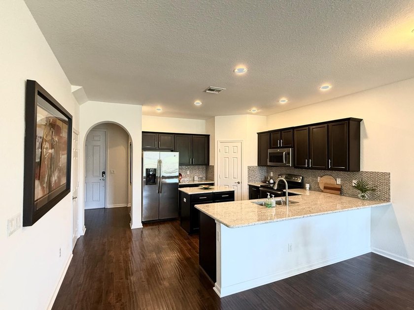 Step into this beautifully maintained 3-bedroom, 2.5-bath - photo 12