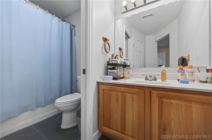 Escape to Lake of the Ozarks in this peaceful country setting - photo 18