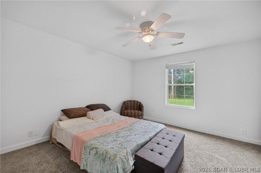 Escape to Lake of the Ozarks in this peaceful country setting - photo 24