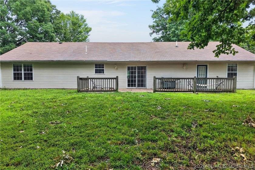 Escape to Lake of the Ozarks in this peaceful country setting - photo 29
