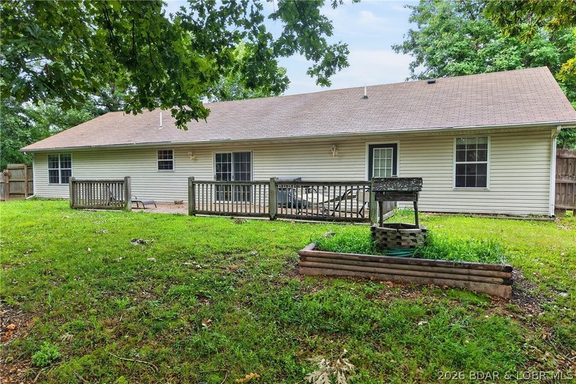 Escape to Lake of the Ozarks in this peaceful country setting - photo 30