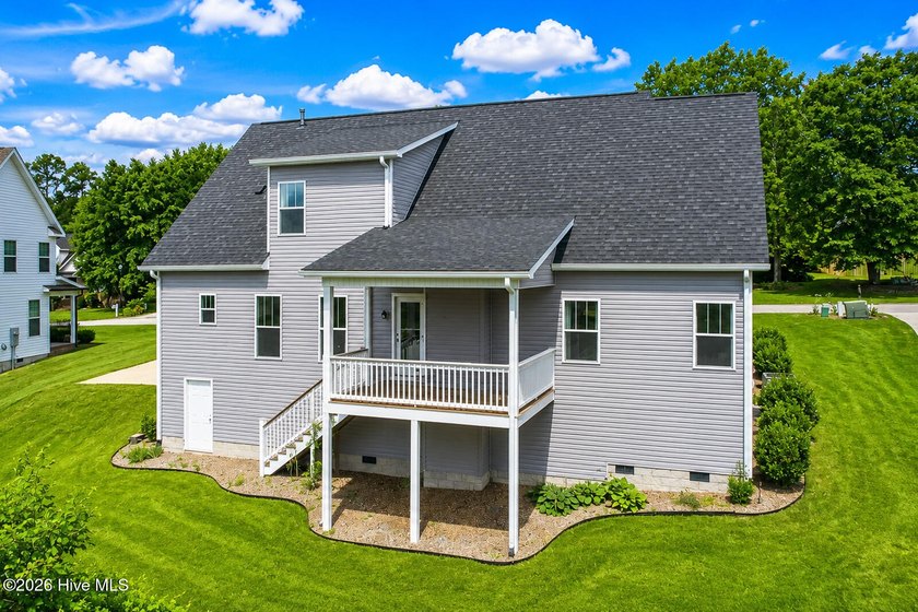 Boasting excellent curb appeal and a welcoming rocking chair - photo 3