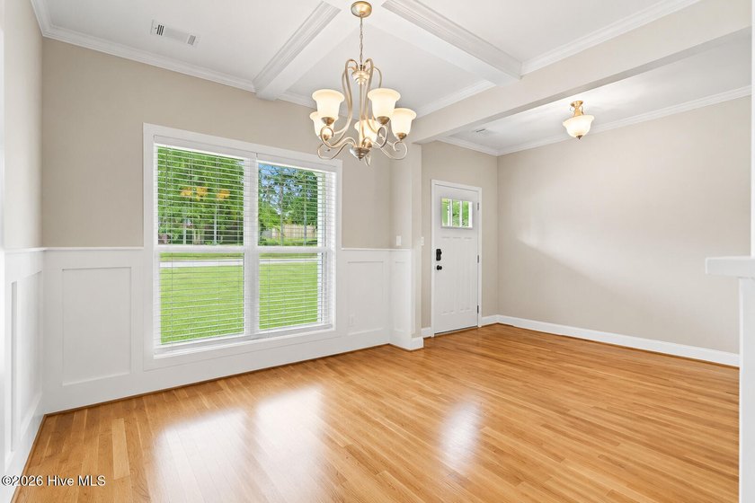 Boasting excellent curb appeal and a welcoming rocking chair - photo 8